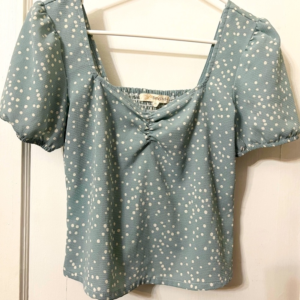 Pale blue crop top with polka dots